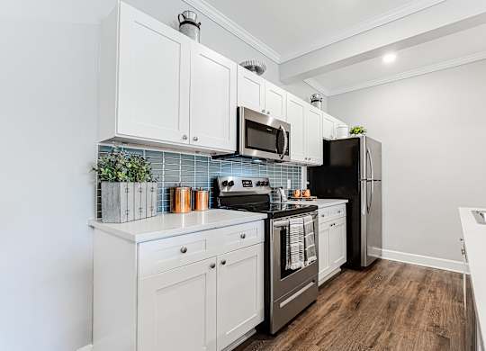 Fully Equipped Kitchen Includes Frost-Free Refrigerator, Electric Range, & Dishwasher at Liberty Club, Georgia, 31313