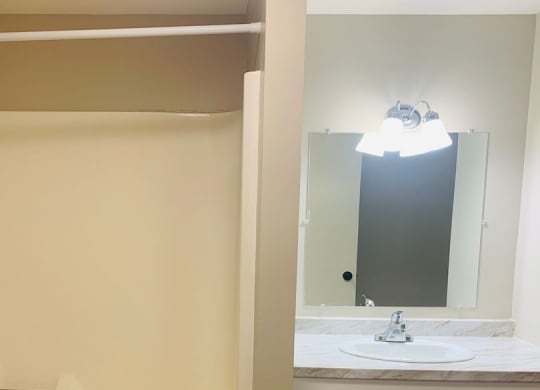 a bathroom with a sink and a bath tub at Briarcliff at Quechee, Quechee, 05059