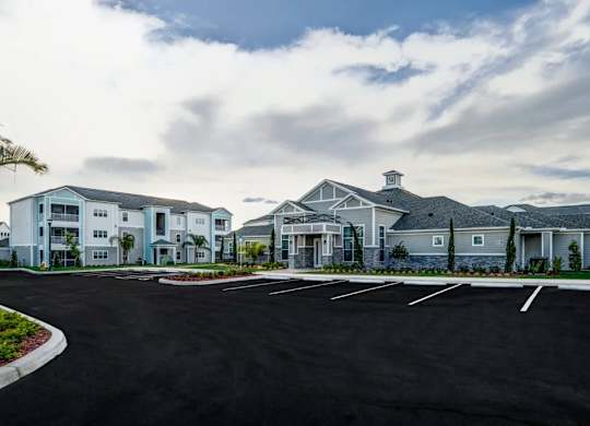 A parking lot in front of a building at Century Ariva, Lakeland, Florida