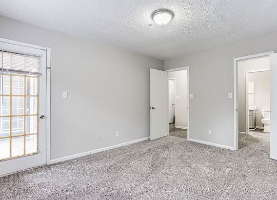 Carpeted Living Area at Wildcreek Apartments, Georgia 30021