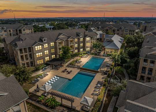 Aerial Pool View In Night at The James on South First, Texas, 78748