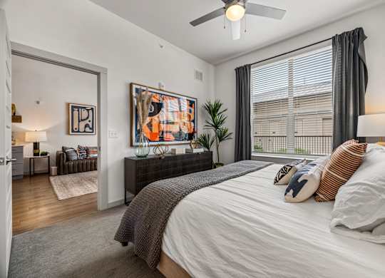 Bedroom With Ceiling Fan at The Haywood Apartments, Austin
