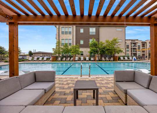 Poolside Relaxing Area at The Haywood Apartments, Texas