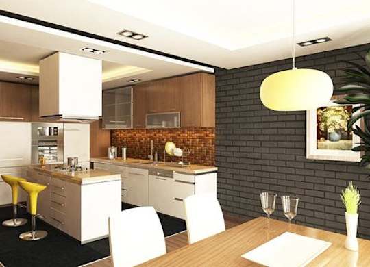 a kitchen with a black refrigerator freezer next to a stove top oven