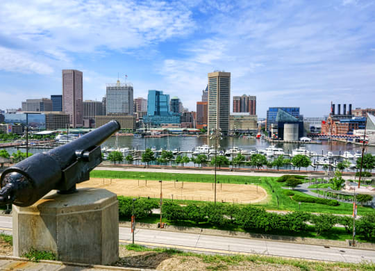 a cannon overlooking the baltimore inner harbor