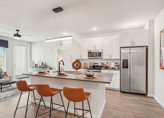 Furnished kitchen in one bedroom apartment model