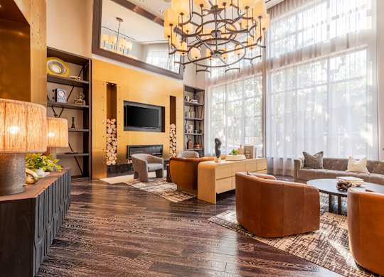 Image showing curved lines, curated comfort. A dynamic concierge space that blends flow with finesse.