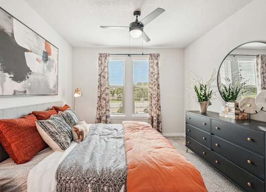 Furnished bedroom in two bedroom model apartment home