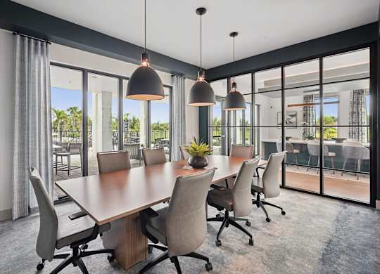 Resident conference room with large table and seating