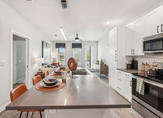 Furnished kitchen in one bedroom apartment model