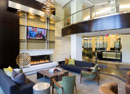 Lobby of Citron with fireplace and TV.