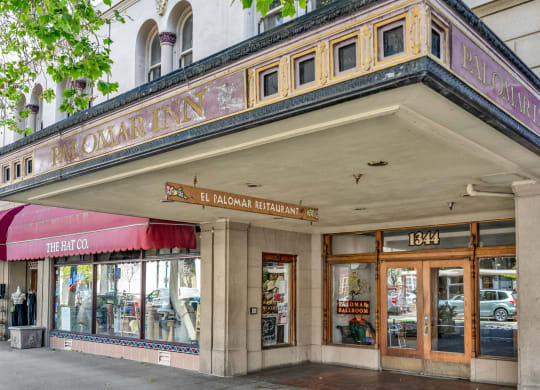 the front of a building with a sign that reads the restaurant