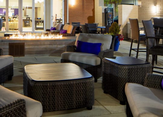 Outdoor patio with seating at night