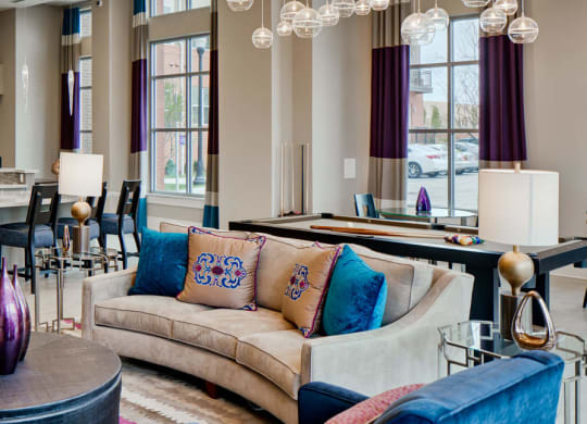 Resident lounge with seating and pool table