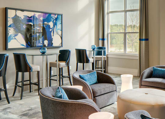 Resident lounge with seating and tables