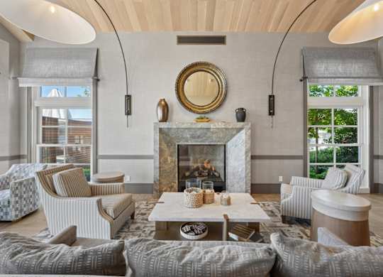 clubroom with fireplace and seating areas