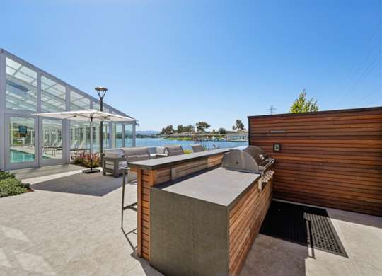 exterior grill area overlooking water