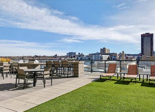 Courtyard with grills overlooking the Denver skyline.