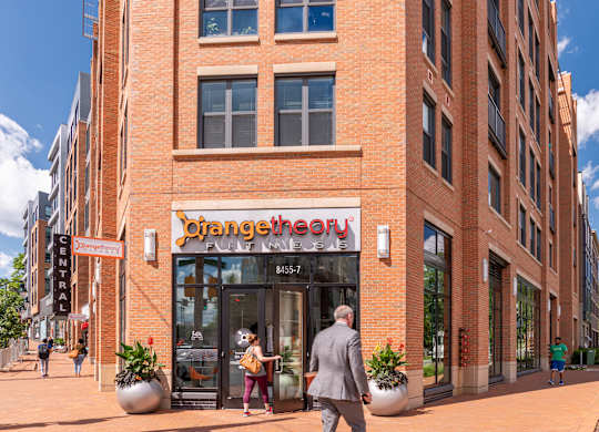 A red brick building with a sign that says