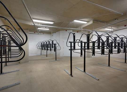 A gym with a variety of exercise equipment.