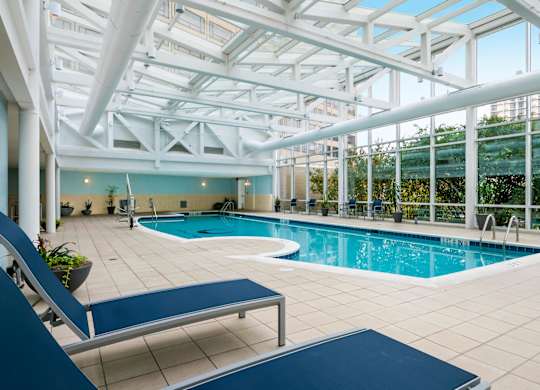 Indoor pool with lounge chairs
