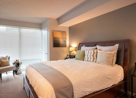 Bedroom with floor to ceiling windows