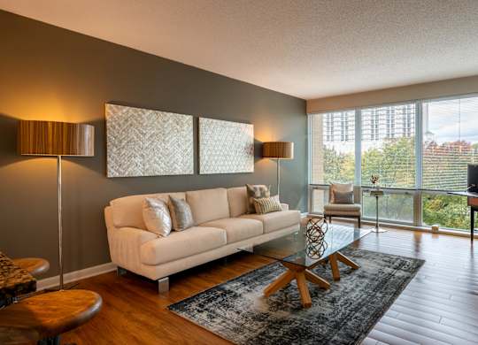Living room with floor to ceiling windows
