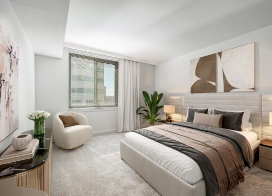 an apartment bedroom with a bed and a window