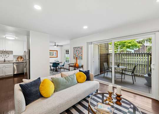 Sunnyvale apartment living room with patio access and natural light