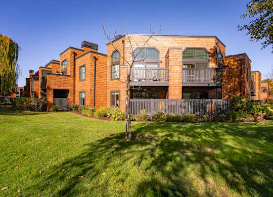 Apartment grounds with lush greenery and landscaped paths at Indian Creek in Redwood City