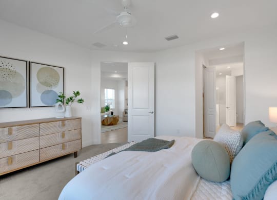 a bedroom with a bed and a dresser at Marisol, Bradenton 34211