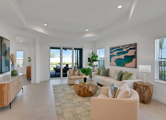 a living room with a couch and a coffee table at Marisol, Bradenton