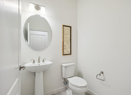Downstairs guest bathroom in Martinique Lakewood Ranch model home