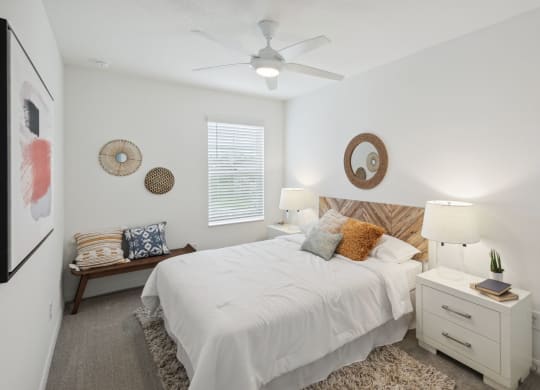 Bedroom with ceiling fan included in 3-bedroom rental home at Martinique