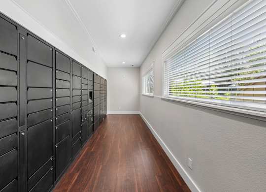 Secure package and mail room at Old Orchard Apartments.