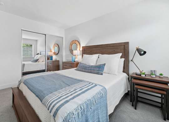 Bedroom with ample space and natural light at Old Orchard Apartments