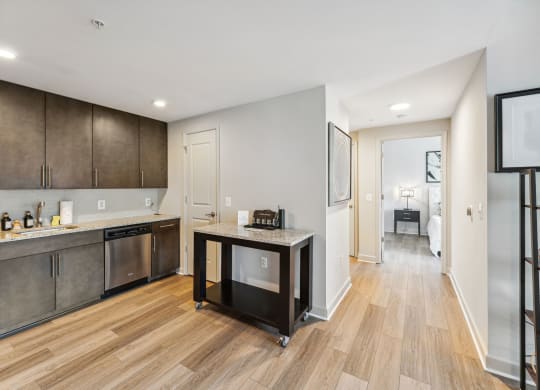 a view of a kitchen and living room in a house