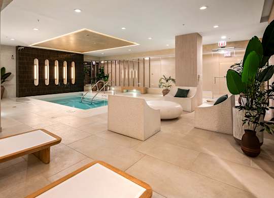 Serene wellness space designed for relaxation, with comfortable seating and a tranquil atmosphere.