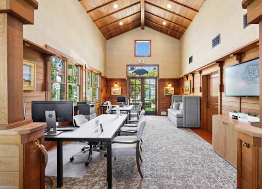 leasing office with wood interiors and multiple seating areas