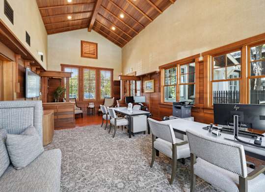 welcoming leasing space with cabin-inspired design