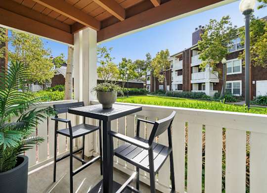 private patio with outdoor space and seating