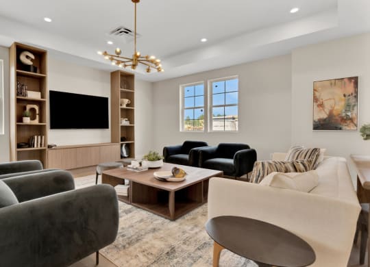 Community lounge with seating and a TV at Brandywine Crossing, Brandywine, MD 20613