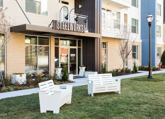 a seating area in front of a building