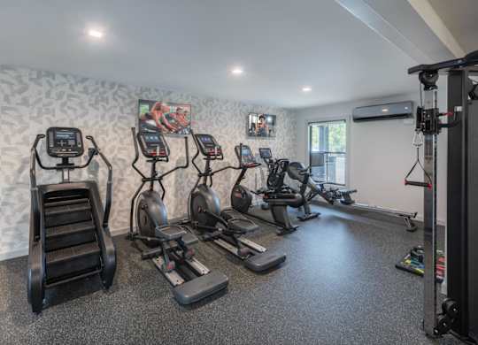 the gym at the monarch luxury apartments in des moines ia