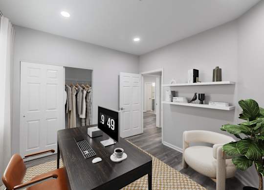 a home office with a desk and a closet