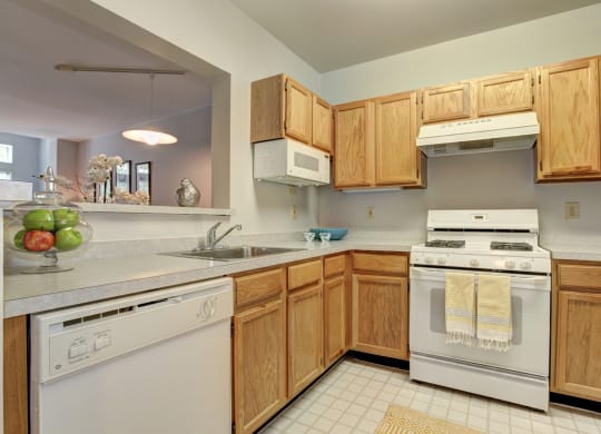 Kitchens equipped with modern appliances and breakfast bar