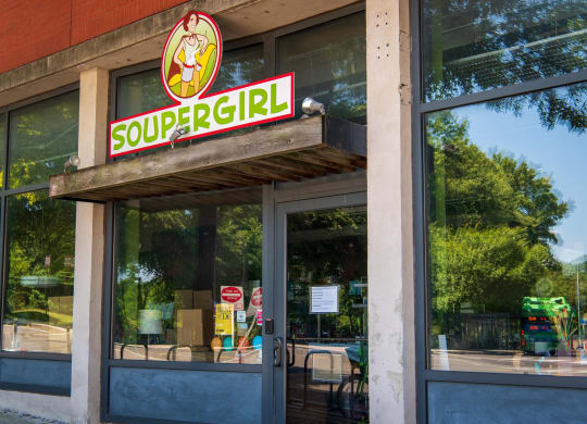 the front of a restaurant with a sourrg sign
