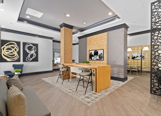 a dining room with a table and chairs in a lobby