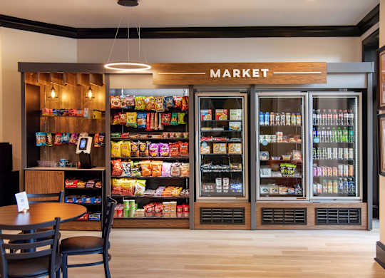 A market with a variety of snacks and drinks on display.