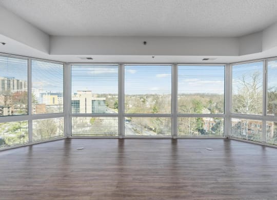 A room with a large full length window